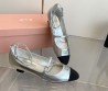 Женские кожаные туфли Miu Miu 2024 серебристые с черным