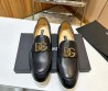 Мужские кожаные лоферы Dolce & Gabbana 2024 черные с золотым логотипом