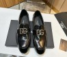 Мужские кожаные лоферы Dolce & Gabbana 2024 черные с серебристым логотипом глянцевые