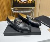 Мужские кожаные лоферы Dolce & Gabbana 2024 черные с серебристым логотипом