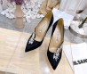 Женские текстильные туфли Manolo Blahnik 2024 черные со стразами