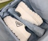 Женские текстильные кеды Prada 2024 белые