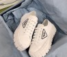 Женские текстильные кеды Prada 2024 белые