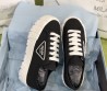 Женские текстильные кеды Prada 2024 черные