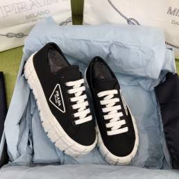 Женские текстильные кеды Prada 2024 черные