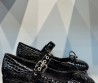 Женские кожаные туфли Miu Miu 2024 черные под рептилию с бантиком