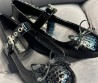 Женские кожаные туфли Miu Miu 2024 черные под рептилию с бантиком