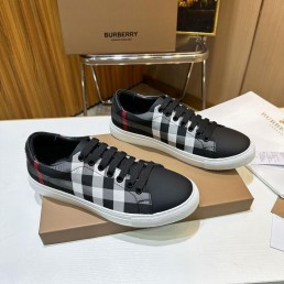 Мужские комбинированные кеды Burberry 2024 черные с белым в клетку