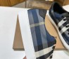 Мужские комбинированные кеды Burberry 2024 синие с бежевым в клетку