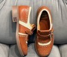 Женские кожаные туфли Miu Miu 2024 коричневые с перфорацией