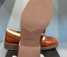 Женские кожаные туфли Miu Miu 2024 коричневые с перфорацией