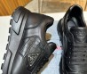 Мужские кожаные кроссовки Prada 2024 черные с вставкой под рептилию