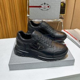 Мужские кожаные кроссовки Prada 2024 черные с вставкой под рептилию