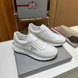 Мужские кожаные кроссовки Prada 2024 белые с вставкой под рептилию