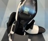 Женские комбинированные туфли Chanel 2024 белые с черным с цветком