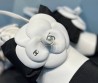 Женские комбинированные туфли Chanel 2024 белые с черным с цветком