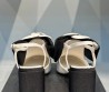 Женские комбинированные туфли Chanel 2024 белые с черным с цветком