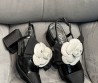 Женские комбинированные туфли Chanel 2024 черные с цветком