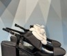 Женские комбинированные туфли Chanel 2024 черные с цветком