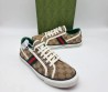 Женские текстильные кеды Gucci 2024 коричневые с мелкими эмблемами