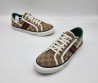 Женские текстильные кеды Gucci 2024 коричневые с мелкими эмблемами