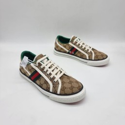 Женские текстильные кеды Gucci 2024 коричневые с мелкими эмблемами