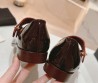 Женские кожаные туфли Chanel 2024 бордовые с ремешком лакированные