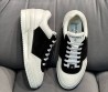 Женские кожаные кроссовки Chanel 2024 белые с черными замшевыми вставками