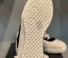 Женские кожаные кроссовки Chanel 2024 белые с черными замшевыми вставками