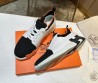 Мужские комбинированные кроссовки Hermes 2024 белые с черным