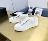 Женские текстильные кеды Chanel 2024 белые с золотистым значком