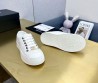 Женские текстильные кеды Chanel 2024 белые с золотистым значком