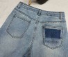 Женские джинсы Saint Laurent 2024 синие с эмблемами на кармане