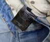 Женские джинсы Saint Laurent 2024 синие с эмблемами на кармане