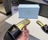 Женские кожаные шлепки Prada 2024 черные с золотистым логотипом