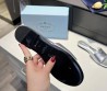 Женские кожаные шлепки Prada 2024 серебристые с логотипом