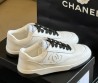 Женские кожаные кроссовки Chanel 2024 белые с черными шнурками