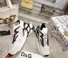 Женские комбинированные кроссовки Dolce & Gabbana 2024 белые с черными элементами