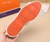 Мужские кожаные лоферы Santoni 2024 черные гладкие с кисточками