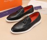 Мужские кожаные лоферы Santoni 2024 черные гладкие с кисточками