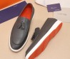 Мужские кожаные лоферы Santoni 2024 серые с кисточками
