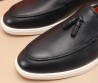 Мужские кожаные лоферы Santoni 2024 с кисточками черные