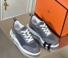 Мужские комбинированные кроссовки Hermes 2024 серые с серой буквой на подошве