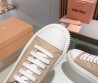 Женские текстильные кеды Miu Miu бежевые 2024