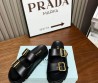 Женские кожаные шлепки Prada черные с золотыми пряжками 2024