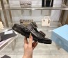 Женские кожаные шлепки Prada черные с серебряными пряжками 2024