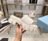 Женские плетёные шлепанцы Prada Monolith белые на тракторной подошве 2024