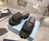 Женские плетёные шлепанцы Prada Monolith черные на тракторной подошве 2024