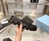 Женские плетёные шлепанцы Prada Monolith черные на тракторной подошве 2024