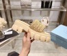 Женские плетёные шлепанцы Prada Monolith бежевые на тракторной подошве 2024